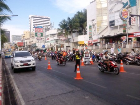 Police set up traffic check-points before Songkran in front of the Royal Garden Plaza.