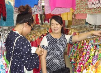 Mayjira Kongkeaw, owner of the Norm Boutique shop, said sales have dropped this year so she cut her prices to 180 baht.