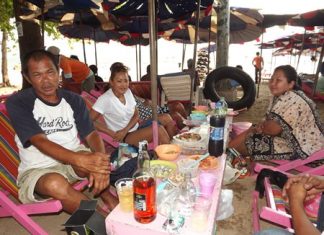 Bangkok tourist Nisa Keawkat (white t-shirt) said she doesn’t drink much herself, but thinks drinking during Songkran is normal for many people.