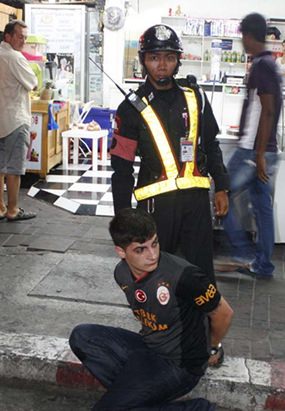 Police arrested Semih Bele on assault charges after he stabbed his friend.