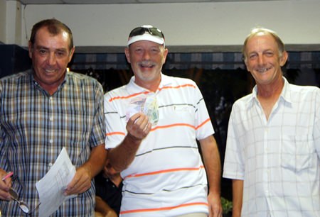 Bob Poole (center) receives his prize from Glyn Evans (left) and Chris Voller.