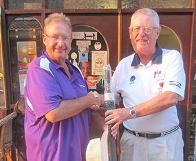 Dick Warberg (right) presents the MBMG Group Golfer of The Month award to Andre Van Dyk.