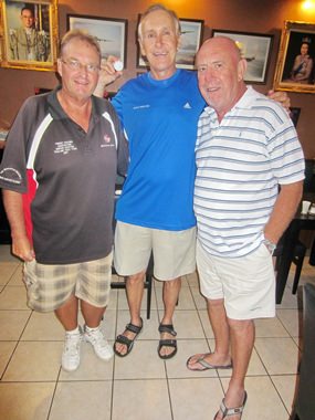 Mike O’Brien and Andre Van Dyk pose with hole in one exponent, Doug Maiko.