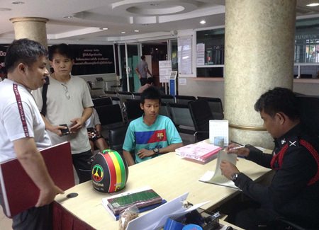 Phermpoon Namlert reports the terrifying robbery to police.