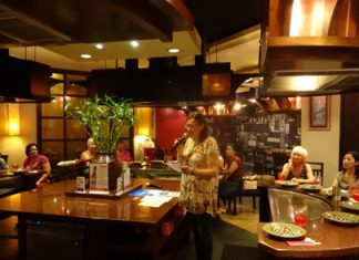 PILC President Helle Rantsen welcomes members to the May luncheon at Benihana.