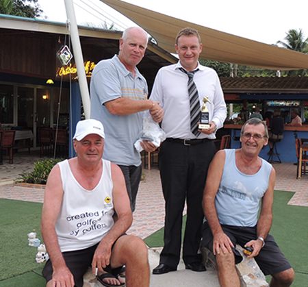Greg Hirst from sponsors DeVere (2nd right) presents the monthly medal award to Paul Greenaway (2nd left) with runners-up Mann and Dennis Pelly sitting in the foreground.