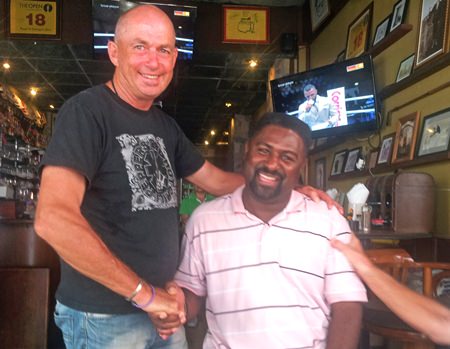 Golf Captain Phil Smedley (left) with double winner Ron Delk.