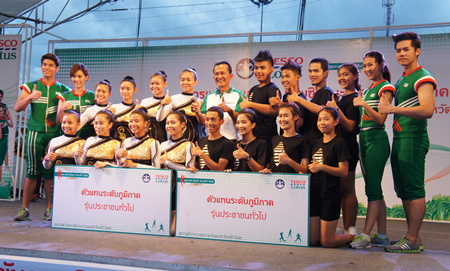 Winning teams pose on stage at the end of the competition.