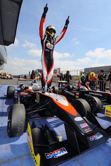 Sandy Stuvik celebrates on his car after winning the second race of the season opening round of the EuroFormula Open at the Nurbürgring in Germany, Sunday, May 4.