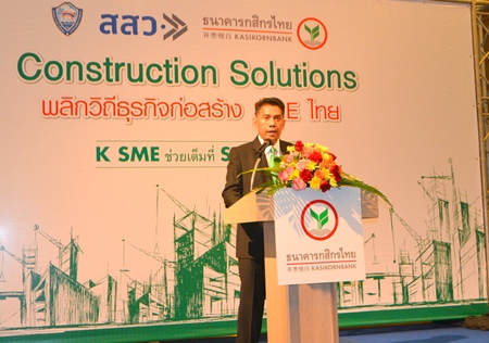 Phiphawat Phattranawik, assistant MD of Kasikorn Bank, welcomes customers to the event.