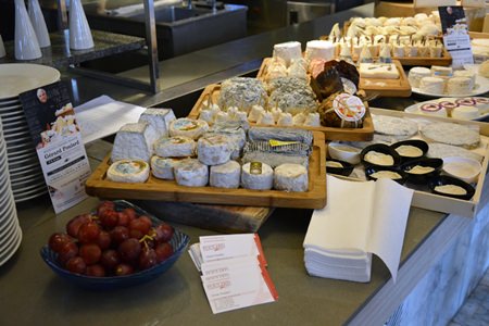 The vast selection of cheese available at the cheese dinner.