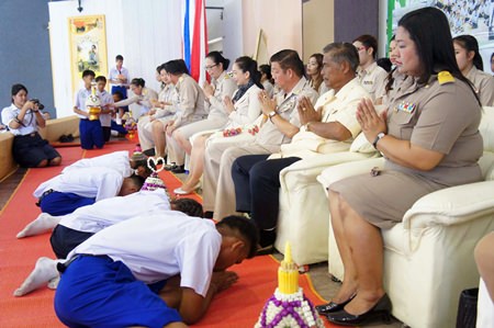 Pattaya School No. 11 students prostrate themselves before their teachers and school administrators as a sign of respect at the beginning of the school year.