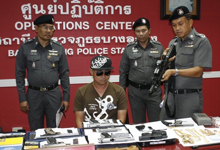 Damrongsak Rakyat is arrested for allegedly possessing a cache of weapons, as well as undisclosed human-trafficking charges.