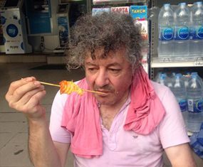 Antonio Lardo, shown here eating near the beach, later drowned in North Pattaya waters.