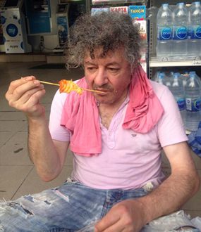 Antonio Lardo, shown here eating near the beach, later drowned in North Pattaya waters.