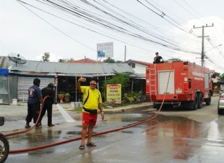 Nongprue residents want East Pattaya spruced up Pattaya’s Engineering Department uses high powered water spray to clean off sand dropped by soil-delivery trucks in front of Suttawas Temple.