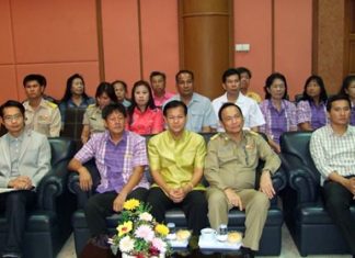 Udomsak Charoenwut, vice president of the Chonburi Provincial Administrative Organization and members of the Chonburi PAO prepare to train “village health volunteers” at Bankao Sub-district offices in Panthong.