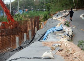 An earthen wall under construction at a View Talay Condo building site on Big Buddha Hill collapsed on June 5, but no one was injured.