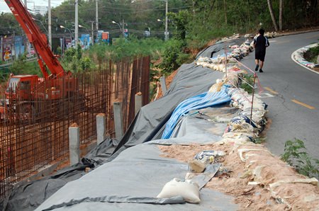 An earthen wall under construction at a View Talay Condo building site on Big Buddha Hill collapsed on June 5, but no one was injured.