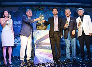 Directors and management of Siam@Siam Hotels join public officials on stage for the grand opening of the new, stylish Siam@Siam Design Hotel Pattaya at a lavish party held May 24. (Standing left-right) Prathanporn Pornprapha, Assistant Managing Director of Siam@Siam Design Hotel Pattaya; Pornpinit Pornprapha, Managing Director of Siam@Siam Hotels; Itthiphol Kunplome, Mayor of Pattaya City; Dr. Pornthep Pornprapha and former senator Sutham Phanthusak, MD of Woodlands Resort Group.