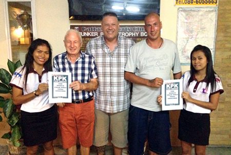 Winners of the two KPK vouchers for May, Gerry Cooney and Thomas Nyborg with Buff and two helpers.