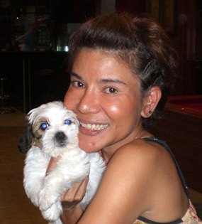 Mod Chaviraksa, winner at St Andrews, with her pet dog.