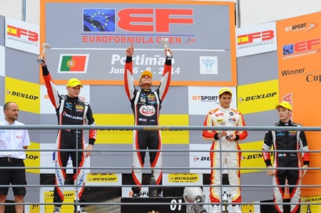 Thailand’s Sandy Stuvik (centre) celebrates on the podium after winning Race 2 of the Euro Formula Open round at the Portimao Circuit in Portugal, Sunday, June 8.