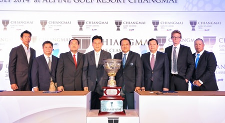 Tournament organizers and former Chiang Mai Governor Wichien Puthiwinyoo are shown with the Chiang Mai Golf Classic trophy.