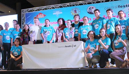 Officials from the YWCA Association, Pattaya City Hall, Central Pattaya Beach and the Pattaya Walk-Run Club pose at the June 12 press conference to announce the walk-run event.