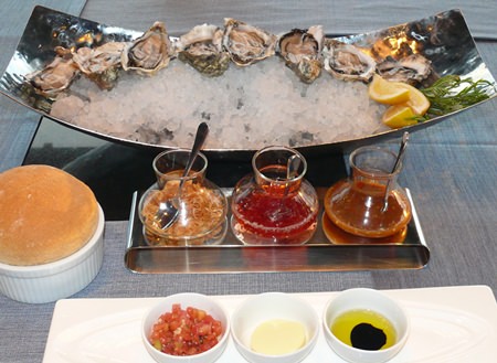 The Oyster and Bubble promotion features Fines de Claire oysters.