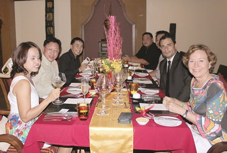 Guests are ready to indulge themselves in a culinary treat.