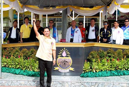 Mayor Itthiphol Kunplome fires the starting pistol as top officials look on during the opening ceremony for the 6th annual Rachapruek Games.