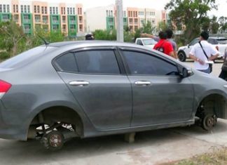 Thieves in the night made off with all 4 wheels, leaving the car on blocks.