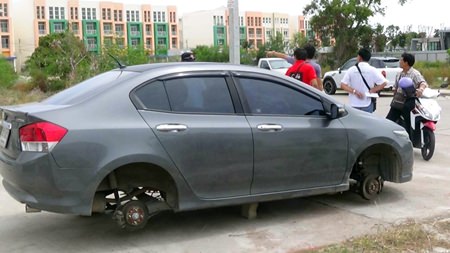 Thieves in the night made off with all 4 wheels, leaving the car on blocks.
