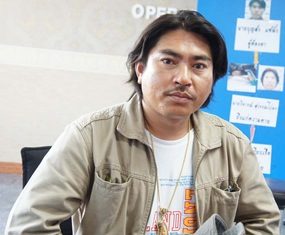 Boonsong Saechau turned himself in to police to face charges of gunning down his cousin in a fit of jealousy.