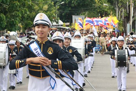 The marching band from Sattahip School leads the procession around Sattahip.