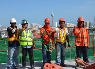 Foreign laborers who have obtained temporary work visas are back to work at construction sites around Pattaya.