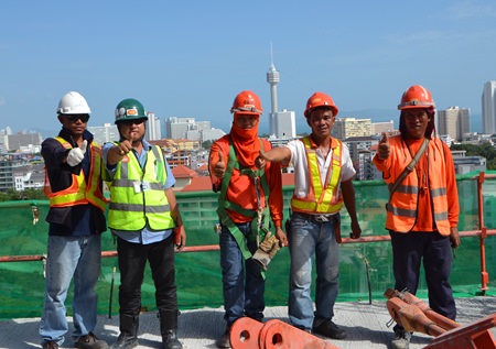 Foreign laborers who have obtained temporary work visas are back to work at construction sites around Pattaya.
