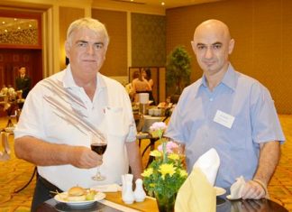 Jorg Machill (left), Manager of the German Ambulance & T.T. Co., Ltd. chats with Ilya Roitman (right), CEO of the Soft Control Ltd.