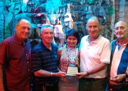 Jean Morel Memorial winners, Donal McGuigan and Declan Kelly, receive the trophy from Khun Tookta, flanked by David Thomas and Len Jones.
