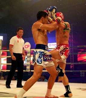 Fighters are shown in action at the Muay Thai Vigo Championship held in Chonburi city, Friday, July 25.