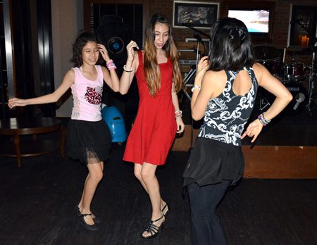 Young, local hipsters get into the Salsa mood at Havana Bar.