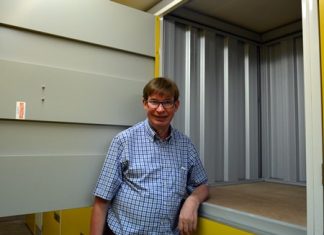 Jan Olav Aamlid, the Managing Director of Pattaya Self Storage demonstrates one of the medium sized lockers.