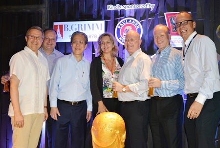 The main sponsors of the night pose for a group photo. (L to R) Andre Brulhart, General Manager of the Centara Grand Mirage Beach Resort Pattaya, Greg Watkins, Executive Director of the BCCT, Phongsakdi Chakshuvej, President of the GTCC, Judy Benn, Executive Director of the AmCham, Graham Macdonald, President of the SATCC, Simon Landy, Executive Chairman of Colliers International, and Jorg Buck, Executive Director of the GTCC.
