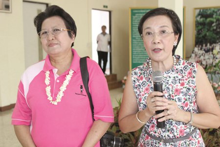 Radchada Chomjinda (right), the Director of the Human Help Network Thailand (HHN) and Director of Adoptions, and her assistant Suwanna Cheownawin (left) greet the arrivals.