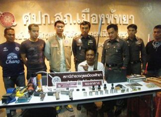 Chuachart Pengpan seems happy to show police his methods for making guns and ammunition.