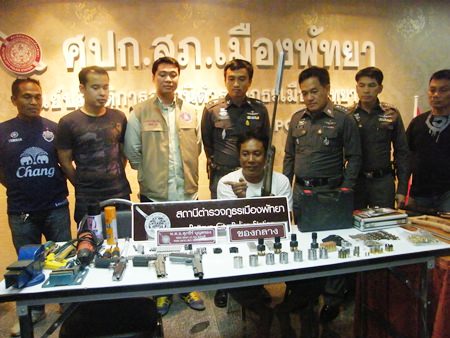 Chuachart Pengpan seems happy to show police his methods for making guns and ammunition.