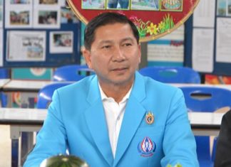 Kophai Community exporting drug-prevention strategy Thanat Pathumdaeng, president of the Mother of Land Fund for Chonburi, presides over the opening of a training session to leverage the Mother of the Land Fund to stamp out drugs at the local level.