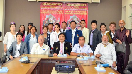 Deputy Mayor Ronakit Ekasingh and Chaiwat Detchonthee, president of Lord Ganesh Worshippers Club, and members announce the festival starting today, Aug. 15 on Soi Buakaow.