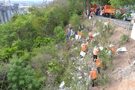 Pattaya municipal officers and over 50 private sector officers help collect trash and waste around the Navy radio station foothills, as it is a popular tourism site and considered a window of Pattaya to the world.